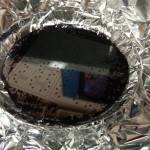 Aluminum foil is placed in the petri dish.